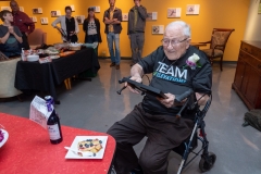 Bill Weber celebrates his 100th birthday with close family and friends at the CU Natural History Museum. (Photo by Glenn Asakawa/University of Colorado)